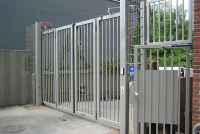 bi-folding gate with adjoining door