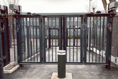 bi fold gate with bollard